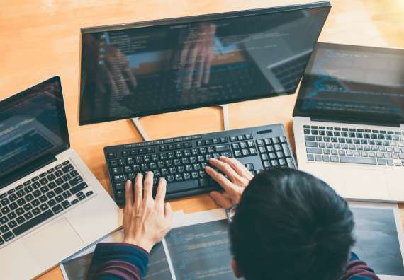 Professional Development programmer working in programming website a software and coding technology